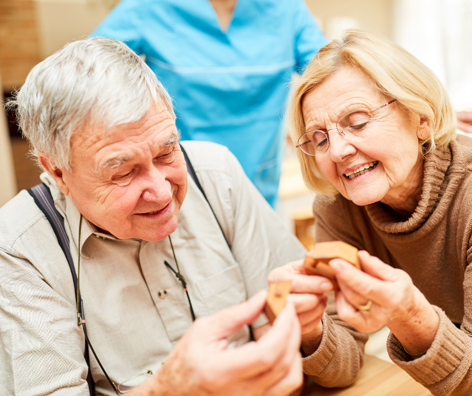 senior man and woman in occupational therapy group